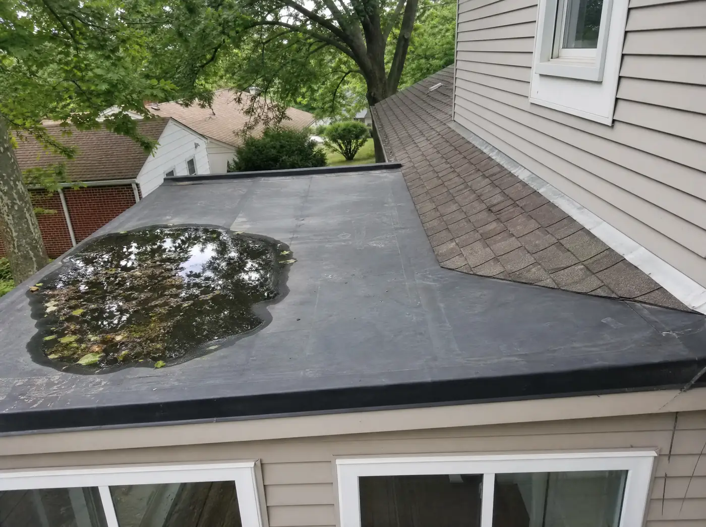 Low-slope EPDM roof section on a mid-century Springfield MO home addition