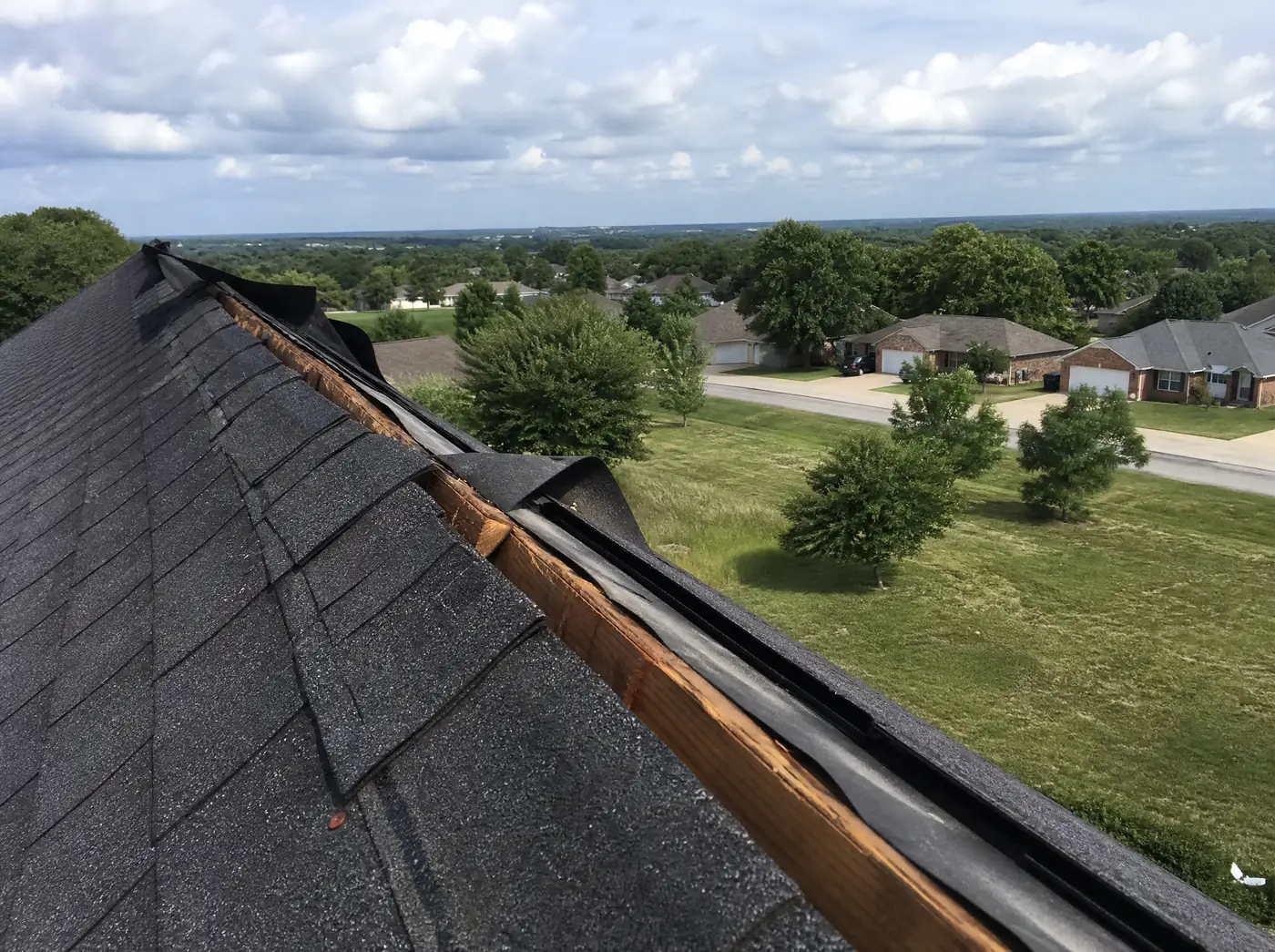Wind and hail damage assessment on a roof in Marshfield, Webster County MO